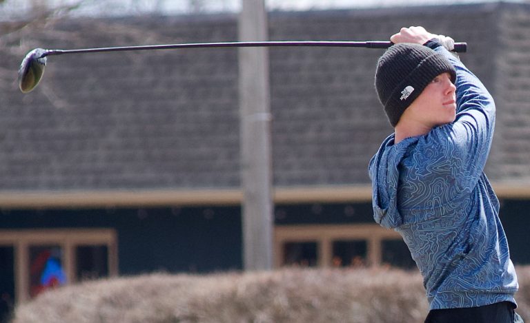 Sophomore Judah Allen watches his shot from the No. 1 tee box during a meet Monday at Litchfield Golf Course.